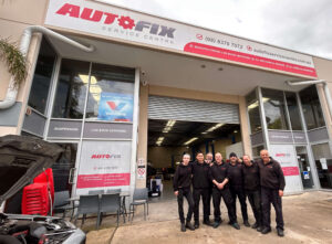 Autofix Service Centre team standing outside work place